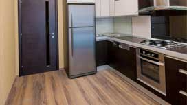 Do I need flooring underneath appliances and countertops?